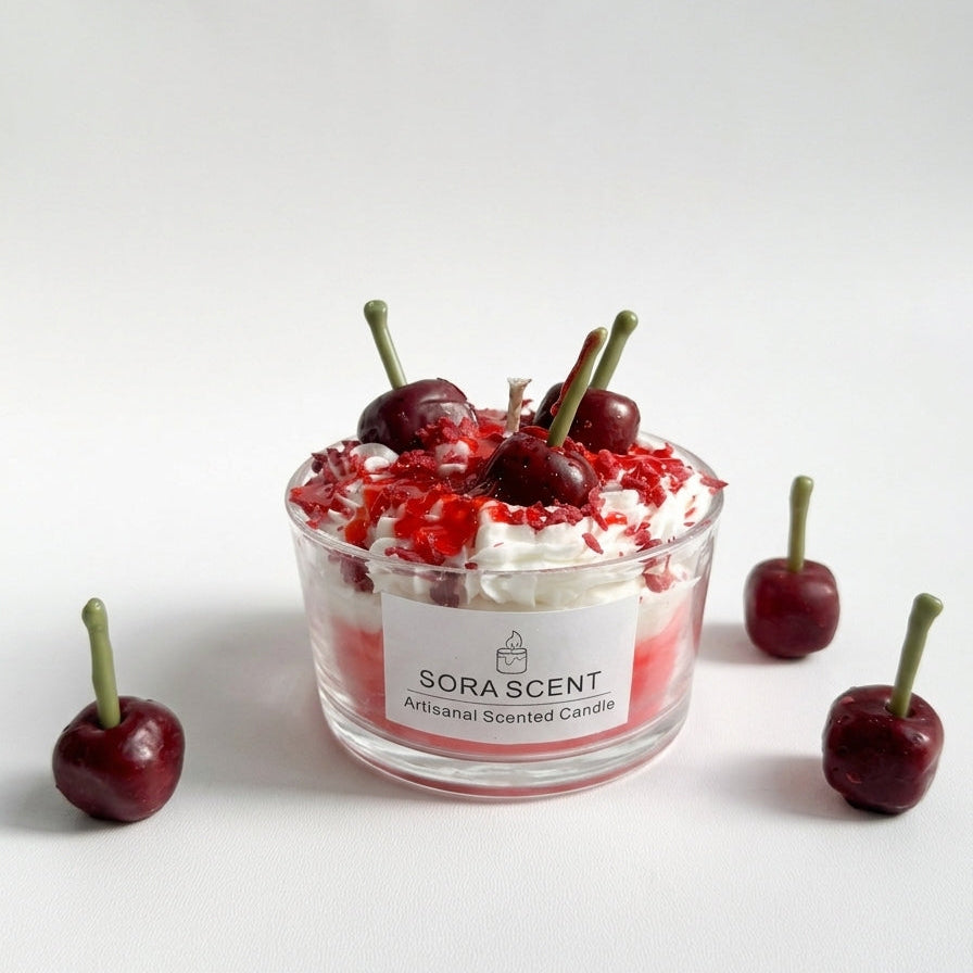 Cherry Vanilla Parfait Glass Bowl Candle displayed on a wooden tray with fresh cherries, books, and soft neutral home decor