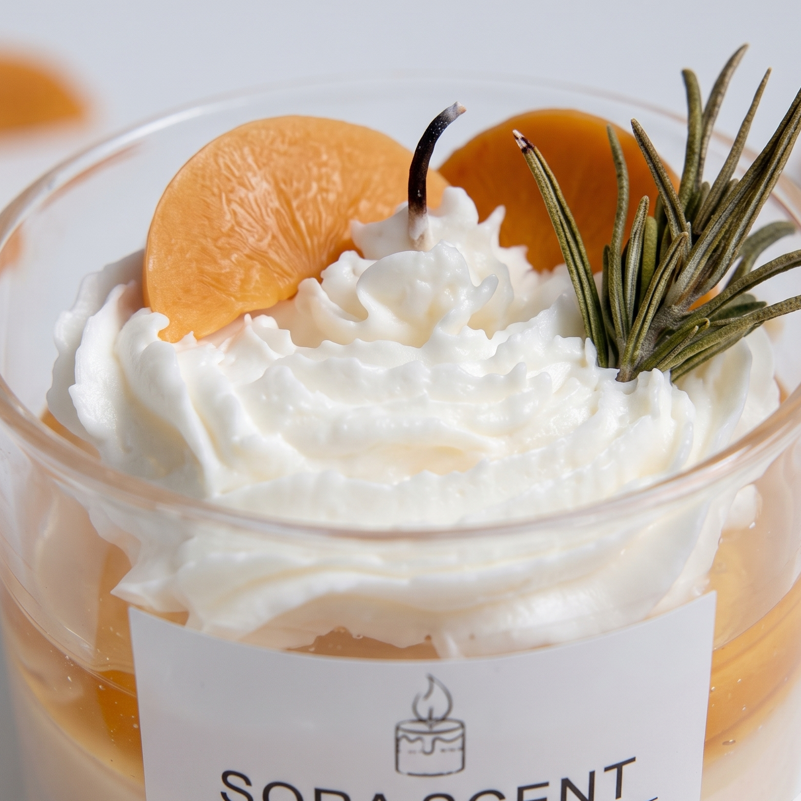 Macro close-up of SORA SCENT's Lavender Peach Cream Tart Candle, highlighting the intricate texture of the piped white soy whipped cream, translucent amber wax fruit slices, and botanical rosemary detail.