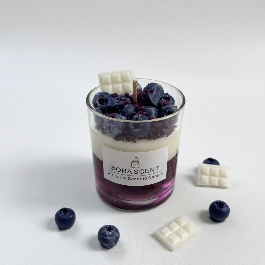 SORA SCENT Blueberry White Chocolate Parfait Candle on a clean background, showcasing its clear glass tumbler, deep purple gel wax base, creamy white soy layer, and detailed blueberry toppers.