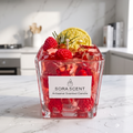 SORA SCENT Strawberry Fizz Cocktail Candle styled elegantly on a modern lounge bar cart next to professional mixology tools and lifestyle magazines, creating a luxury home bar ambiance.